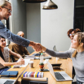 Meeting room handshake